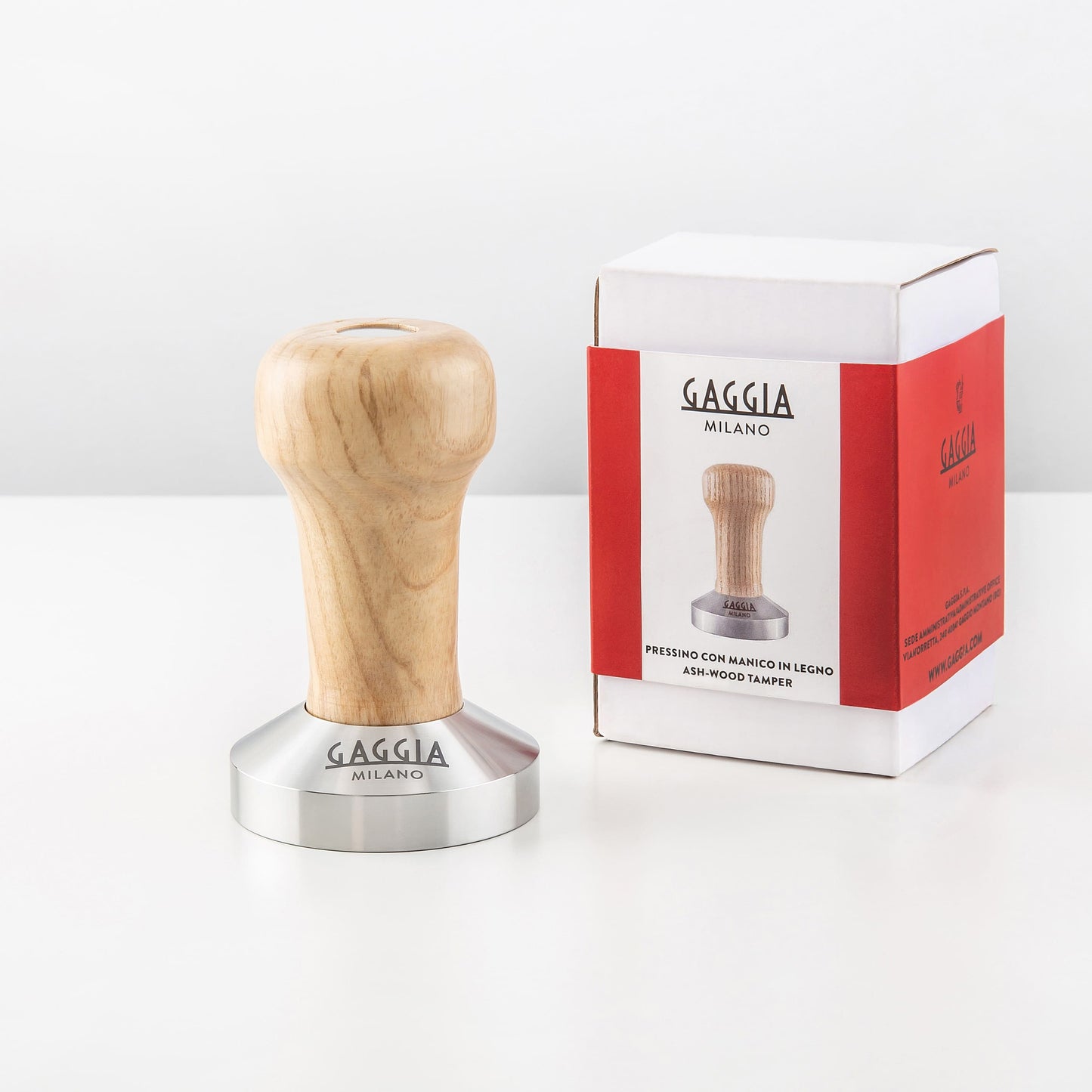 Tamper 58mm Gaggia com cabo ergonômico em madeira de freixo e base em aço inoxidável para compactação de café espresso